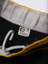 Load image into Gallery viewer, 1980's Black and Yellow Wrestling Shorts