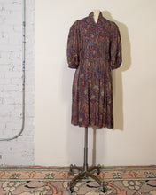 Load image into Gallery viewer, 80s silk paisley pleated dress with puff sleeves and pussy bow