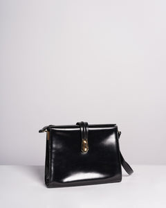 1960s Black leather Structured purse with adjustable strap