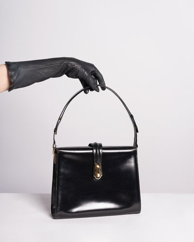 1960s Black leather Structured purse with adjustable strap