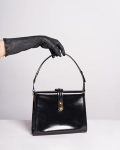 1960s Black leather Structured purse with adjustable strap