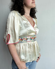 Load image into Gallery viewer, 1960&#39;s Cream Satin Folk Blouse  with Ric Tac  Rainbow Embroidery Peplum Cross Top